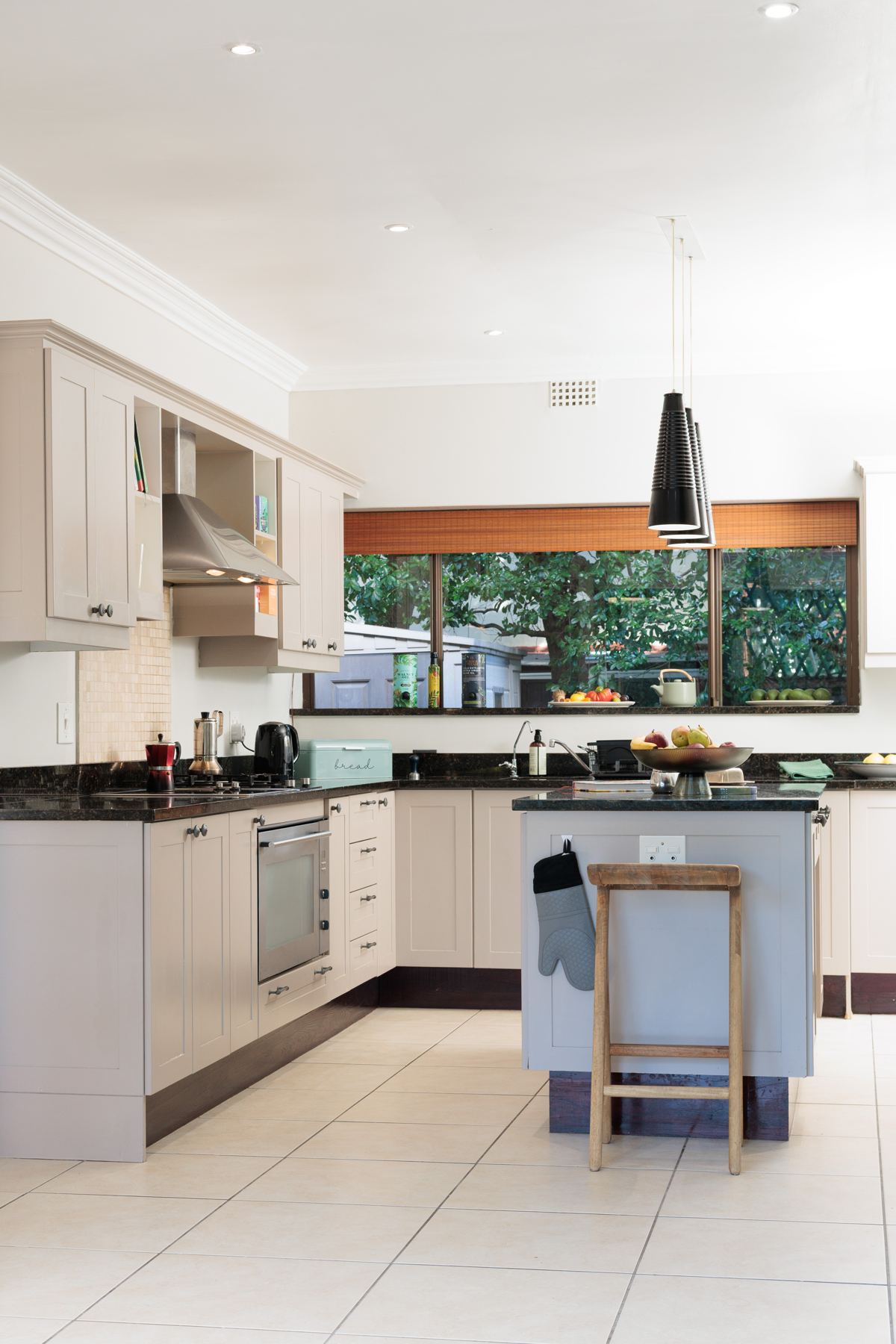 Kitchen island with a breakfast stool