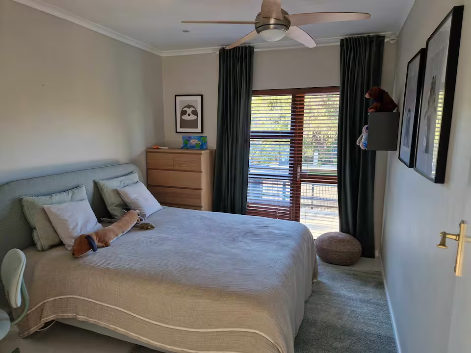 Cozy bedroom with garden balcony