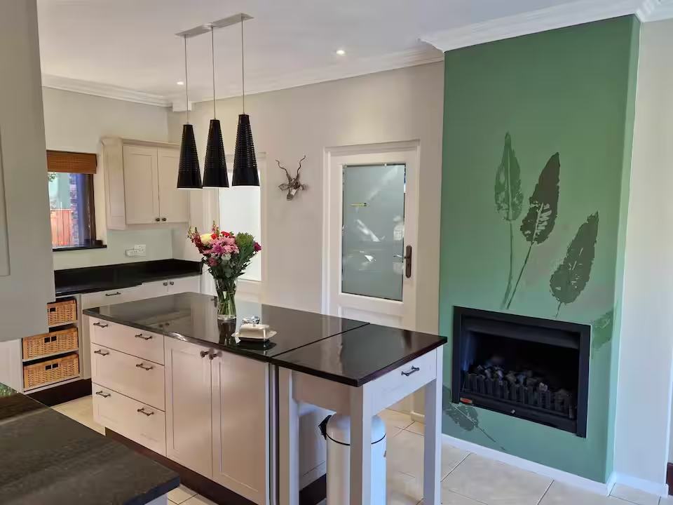 Kitchen with island and fireplace
